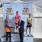 MP Richard Tice getting on with his  work 'representing the people of Boston and Skegness ' by handing out medals at the Boston Marathon.