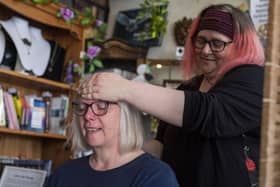 Helen Rogers receives an Indian head massage from Carrie-May Mealor. Photos: Holly Parkinson Photography