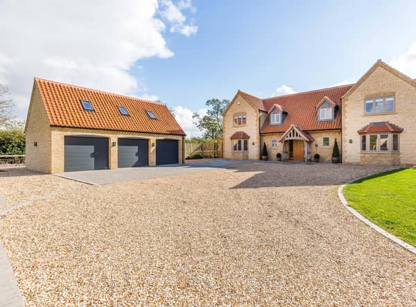 The property is in the village of Scothern and on the market with Savills for £850,000. Photo: Savills