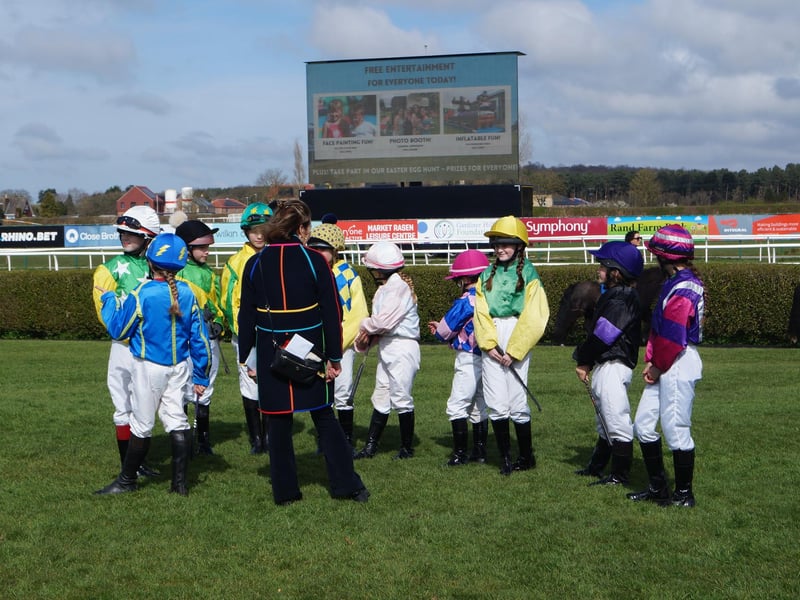 Young jockeys waited in the parade ring ahead of taking to the course before the main racing on their Shetland ponies