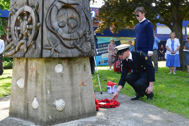 Petty Officer Jones of Boston Sea Cadets laying a wreath.