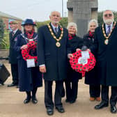 Pictured at Sutton on Sea War Memorial, from left: Councillor Helen Matthews, Mayor Paul Russell, Royal British Legion (Mablethorpe) Chairman Barbara Tyler, Secretary Barbara Hall, Mayor Steve Holland and Councillor Colin Matthews. Photo: Chris Frear Butterfield