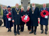 Pictured at Sutton on Sea War Memorial, from left: Councillor Helen Matthews, Mayor Paul Russell, Royal British Legion (Mablethorpe) Chairman Barbara Tyler, Secretary Barbara Hall, Mayor Steve Holland and Councillor Colin Matthews. Photo: Chris Frear Butterfield