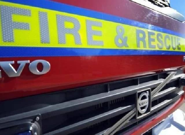 House damaged after fire spreads from caravan and garden hedge in Fulbeck.