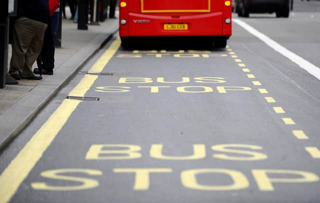 File photo dated 12/04/12 of a bus at a stop. There are just "10 days to act" to avoid bus services being slashed across England, the Labour party has warned. The Government's current funding deal to keep services running despite the fall in demand sparked by the coronavirus pandemic expires at the end of March. Issue date: Tuesday February 7, 2023.