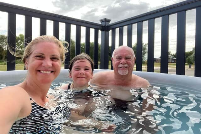 Alan Wooding and his companions enjoy the hot tub