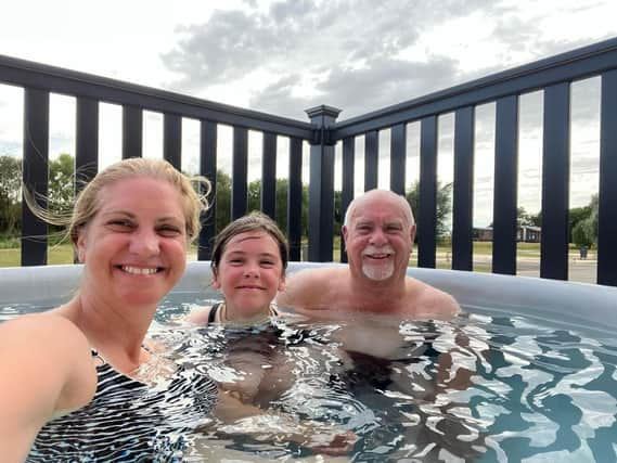 Alan Wooding and his companions enjoy the hot tub