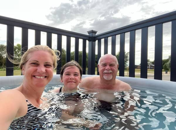 Alan Wooding and his companions enjoy the hot tub