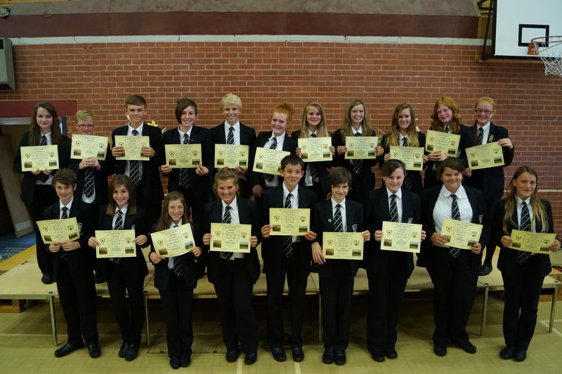 Pictured above are Year Eight prize winners at Market Rasen's end-of-term awards ceremony of 2013. Presentations were made to pupils from Years Seven to 10 for attainment, progress, application and attendance, as well as for achievements in individual subjects. There were also three special awards. Headteacher Ellenor Beighton said the day was a chance to honour and celebrate achievements and 'to think, reflect and look forward'.
