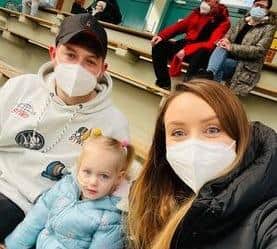 Lily Harley, 3, with mum Emily and dad Josh.
