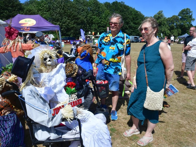 Brian Pinnion, of Spilsby, and Sally Shaw, of Bedfordshire, looking at the Scarecrow exhibits.