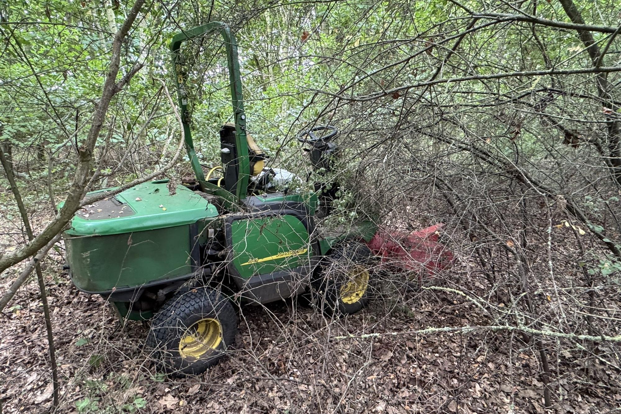 The stolen mower had been hidden in undergrowth by thieves to be picked up later. Photo: Lincs Rural Crime Action Team