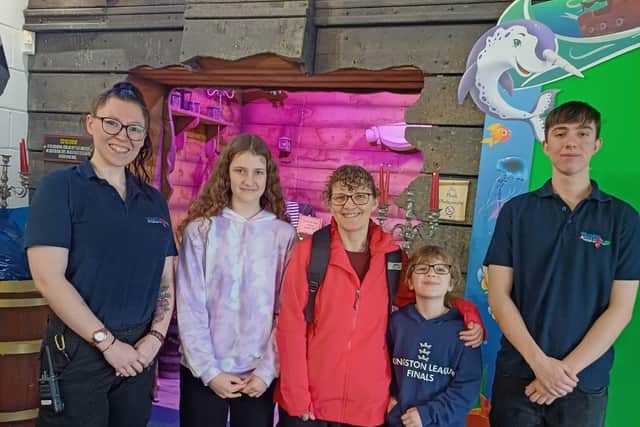Chloe Lansgdale, who is part of the Zoo Crew at Skegness Aquarium, with volunteers Laura, Debra, Amy and Cameron.