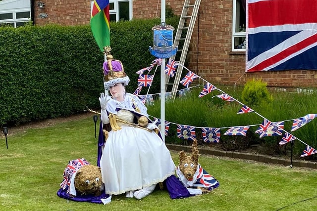 David and Denise Lee created a waving Queen scarecrow complete with Corgi dogs.
