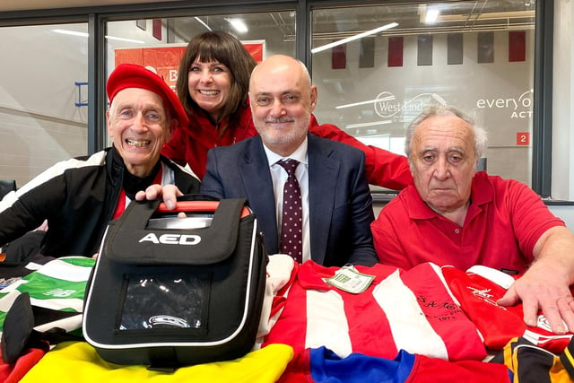 British Heart Foundation co-ordinator Melanie Meik, with Bob and Mal from the Wolds Wanderers and Tony Fenton with the portable defibrillator he has sponsored.
