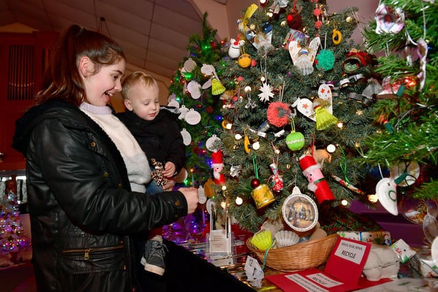 Isabelle Harvey of Sleaford with her nephew Archie Smeeth loving the Methodist Church Christmas Tree Festival.