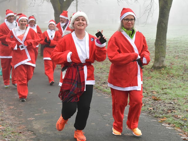Action from this year's Boston Santa Run.