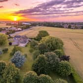 An aerial view of the property and its grounds.