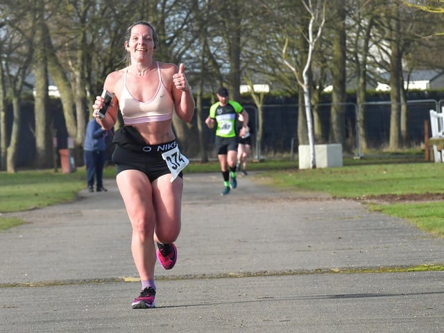 Runners finishing the 10K
