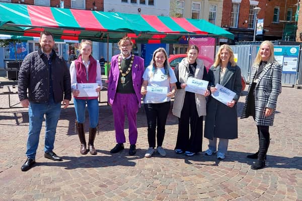 Chairman of West Lindsey District Council, Coun Stephen Bunney, is pictured (centre) with the winner and highly commended traders, along with the judges