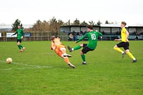 Ryan Lennon scores against Hucknall. Photo: Steve W Davies Photography.