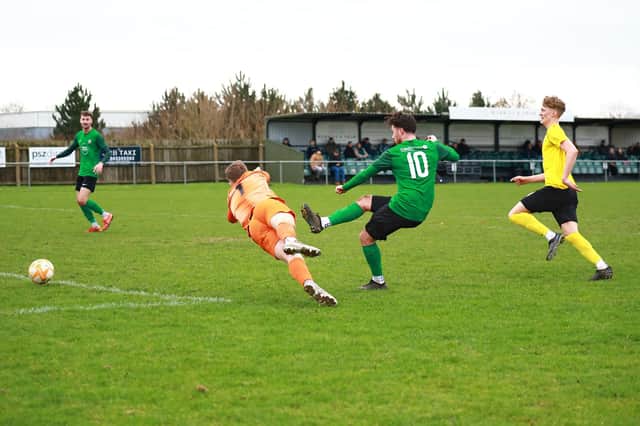 Ryan Lennon scores against Hucknall. Photo: Steve W Davies Photography.
