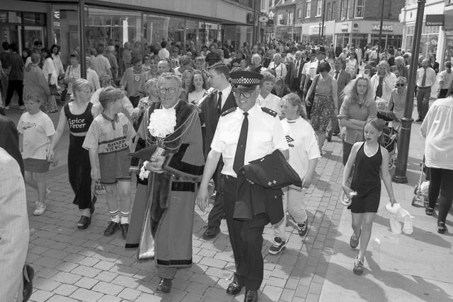 Mayor of Boston Coun Albert Tebbs makes his way through a busy Strait Bargate.