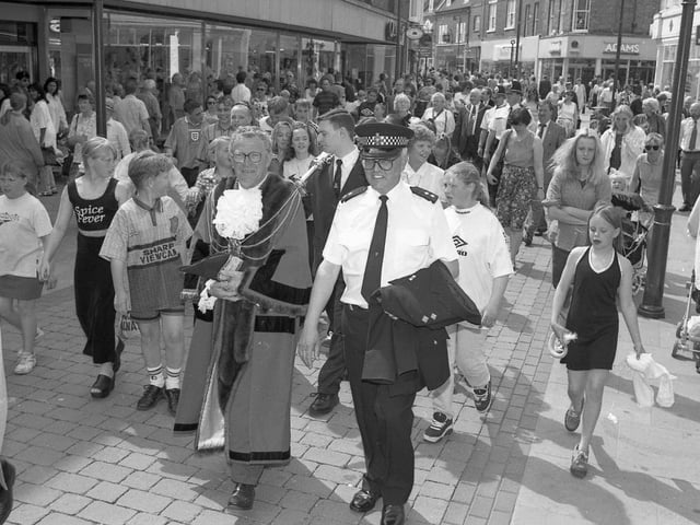 Mayor of Boston Coun Albert Tebbs makes his way through a busy Strait Bargate.