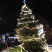 The tree lights switch on at Navenby in 2024.