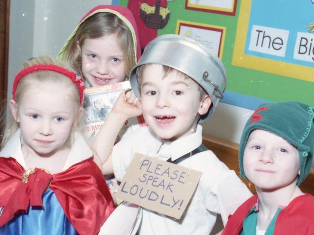 More youngsters from St Mary's RC Primary School, Boston, in February 2000. Barnaby, the Tin Man, is pictured with Joshua, Georgina and Hayley.