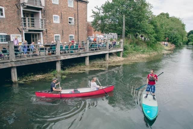 Canoeing and paddle boarding on the canal at the Canal Culture event. Image: Alison Eades