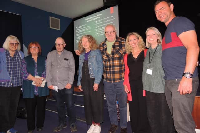 Co-facilitators Chris Wood and Cathy McNulty (third and fourth from left) with speakers and representatives at the Hearing Voices festival.