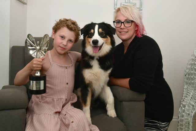 Freya with her mum Gemma Harris and dog Echo.
