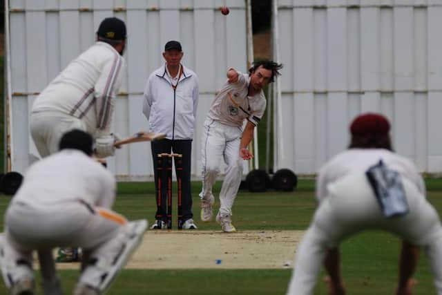 Barend Lourens in full flight bowling.