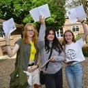 Pictured (from left) Elizabeth Norris, 16, Louise Luck, 16 and Alex Barsby, 16, of Boston.