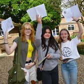 Pictured (from left) Elizabeth Norris, 16, Louise Luck, 16 and Alex Barsby, 16, of Boston.