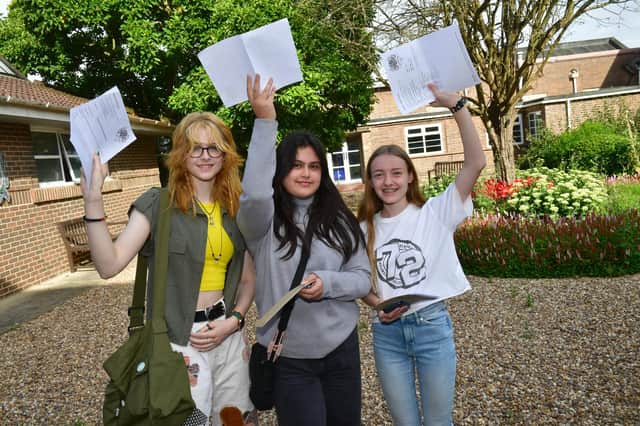 Pictured (from left) Elizabeth Norris, 16, Louise Luck, 16 and Alex Barsby, 16, of Boston.