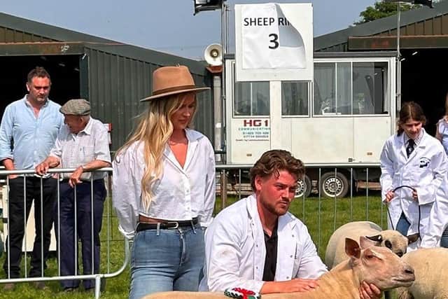 George Hoggard with partner Evie Allan and the prize-winning sheep