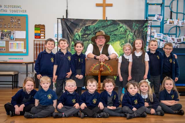 Professional storyteller Mark Fraser with the pupils at Frances Olive Anderson C of E Primary School