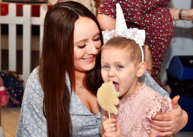 Lily with mum Emily.