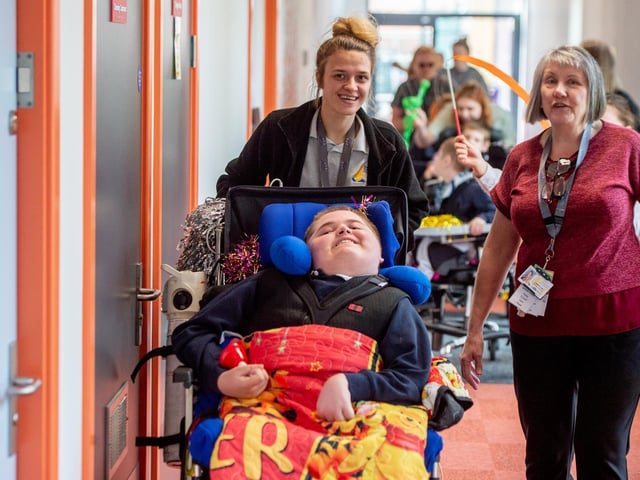 Pupils were shown around their fantastic new school in Boston.