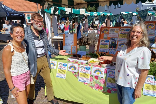 District councillors Moira Westley and Stephen Bunney visited the Rasen Area Environment Group stall to taste some of the community garden's produce. Image: Dianne Tuckett