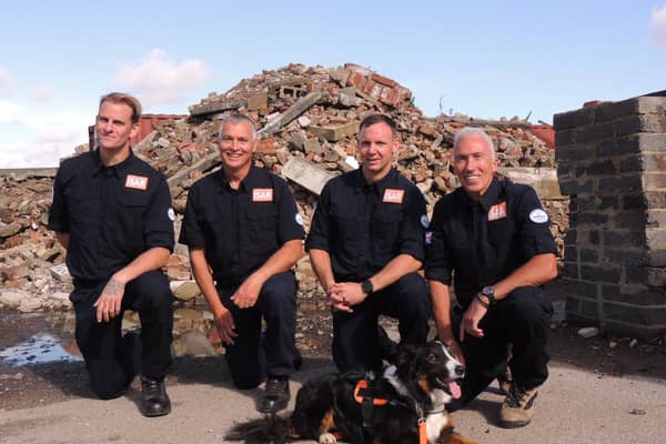 Back from the quake zone in Morocco - from left - firefighters Ben Clarke, Barren Burchnall, Karl Keuneke and Neil Woodmansey, with Colin the search dog.