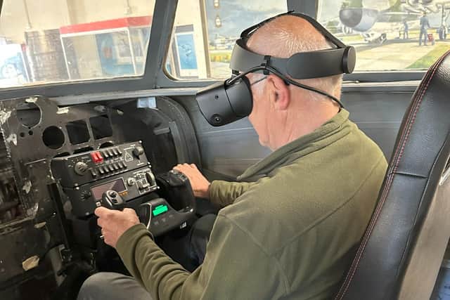 At the controls and ready for take-off.