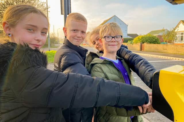 Pupils from Mablethorpe Primary Academy School Councl test the new crossing.