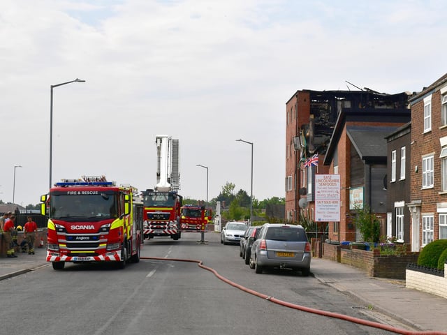 One of the two aerial appliances that responded to the fire can be seen here, with its stabilisers deployed.