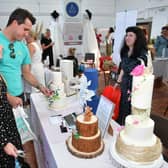 Zoe Atkinson and Gavin Easters of Alford, with Catherine Holmes of Beyond the Icing Cakes, Scredington.