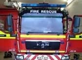 In an emergency dial 999 and ask for the fire service.