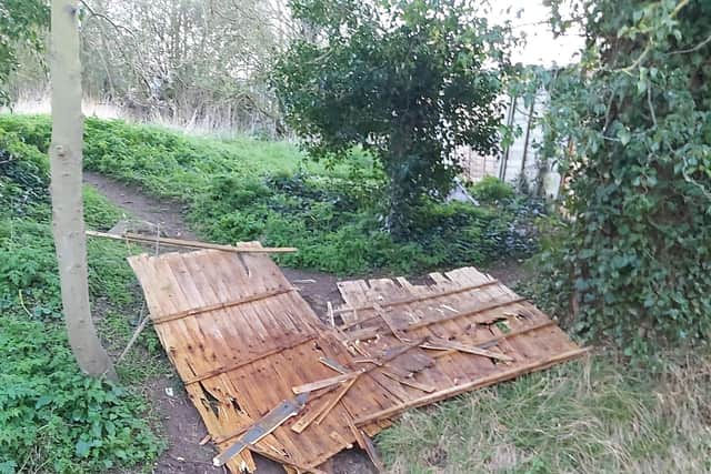 Broken fence panel dumped in the Holdingham Beck, blocking the water flow. Photo supplied