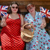 Flying the flag are (from left) Victoria Pacey and Sarah Pacey.